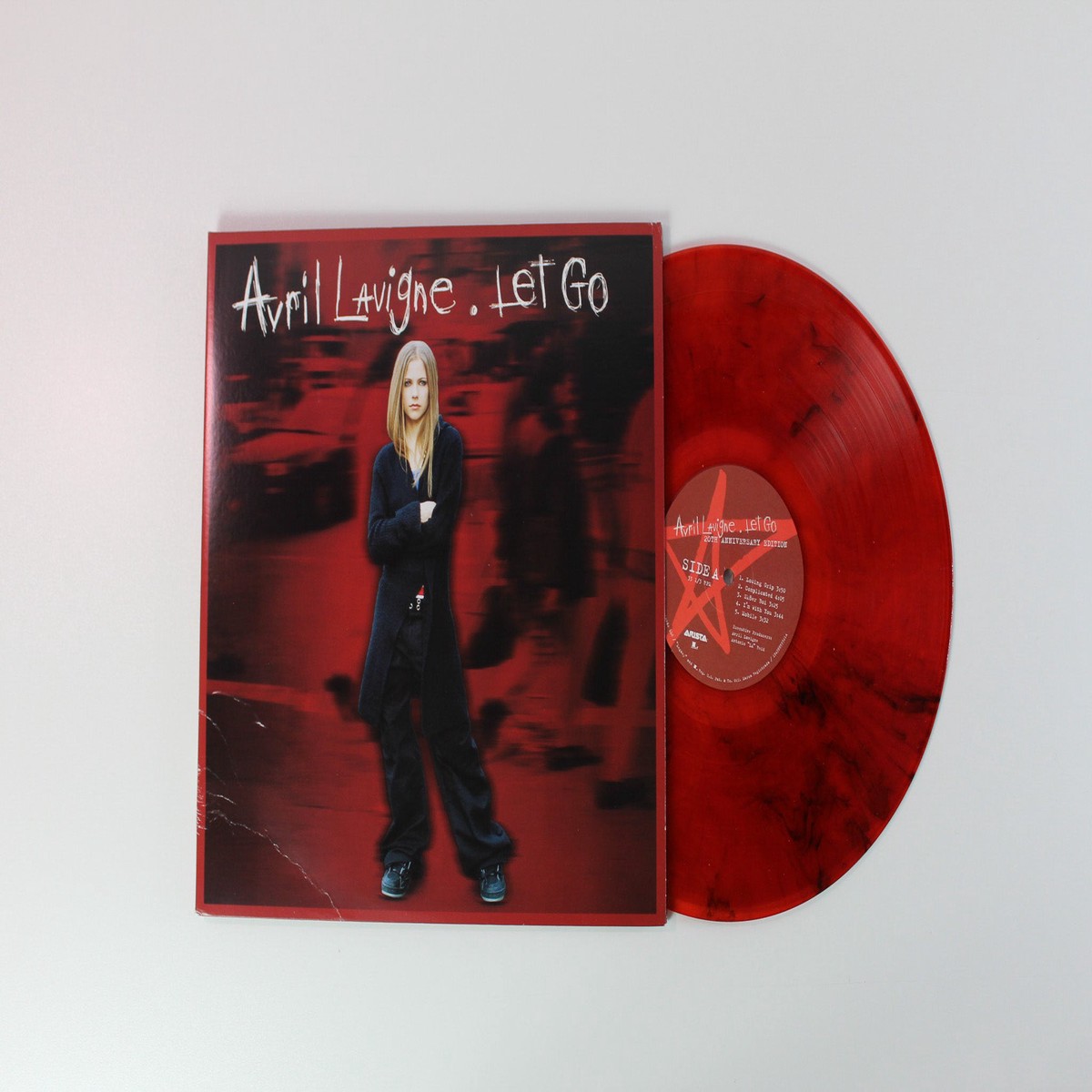 Avril Lavigne - Let Go on Arista Legacy Ltd Red With Black Smoke Reissue
